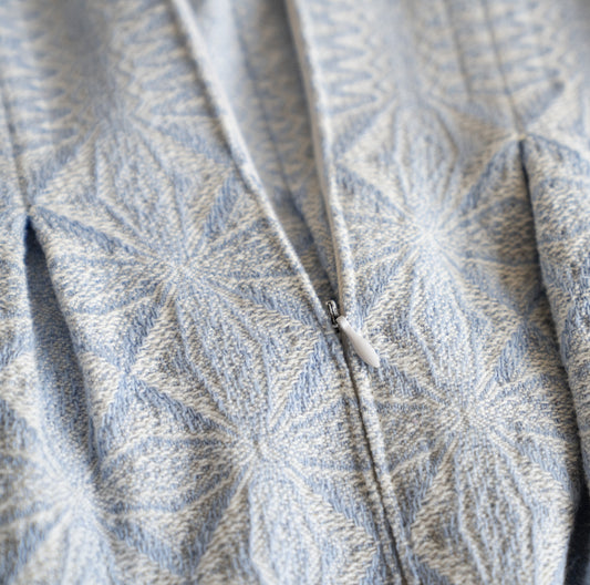 Bildet viser sydd glidelås og illustrerer sykurs i reparasjon med symaskin